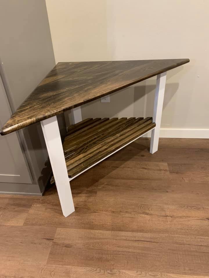 Custom wood corner entertainment table. Perfect for holding a TV in the corner of a room. Built for a customer in St. Cloud, MN.