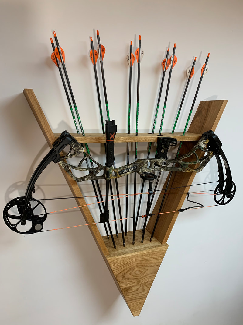 Custom wood bow and arrow wall hanger. Holds up to a dozen arrows and any standard sizes of compound bows.