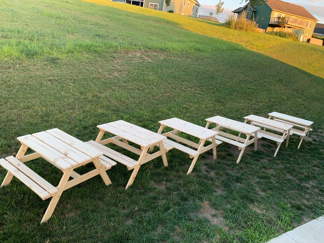 Wood picnic tables for kids and adults. High-quality, affordable wood picnic tables made from pine or cedar will last a lifetime. Paint them or stain them to create the right outdoor environment that matches any home exterior design ideas. 