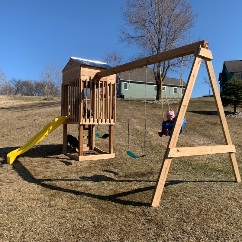 Outdoor wood structures, like playgrounds, are the best way to bring fun and enjoyment to your home for the whole family. This project was built using cedar wood, so it will last for many years to come. High quality construction makes this playground super durable. This custom built playground was made for a backyard in Monticello, Minnesota.