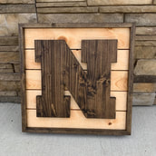 Custom made wood wedding decor, built for a customer who was having a wedding in St. Joseph, Minnesota. This was the perfect center piece for the wedding party's table. This decor matched their wedding venue and wedding theme. 